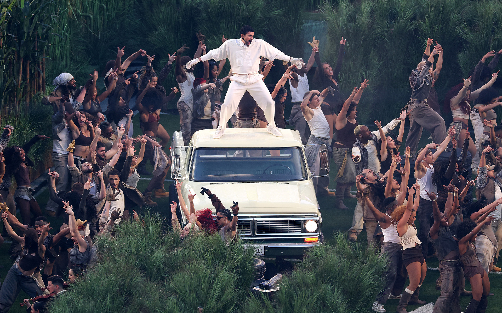 Bad Bunny performs at the Super Bowl Halftime show wearing adidas BadBo 1.0.
