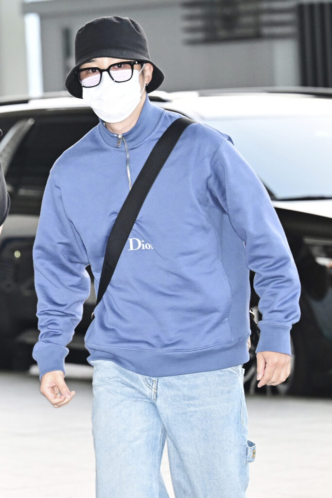 BTS's Jimin wears a Dior quarter-zip. Photo courtesy of Dior press.