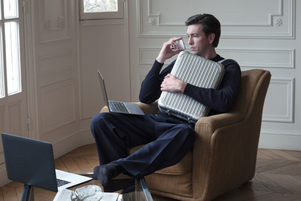Nicholas Braun with RIMOWA Original Backpack. Photo courtesy of RIMOWA.