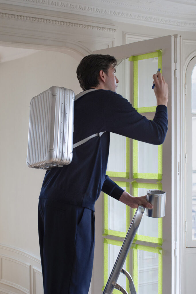 Nicholas Braun with RIMOWA Original Backpack. Photo courtesy of RIMOWA.