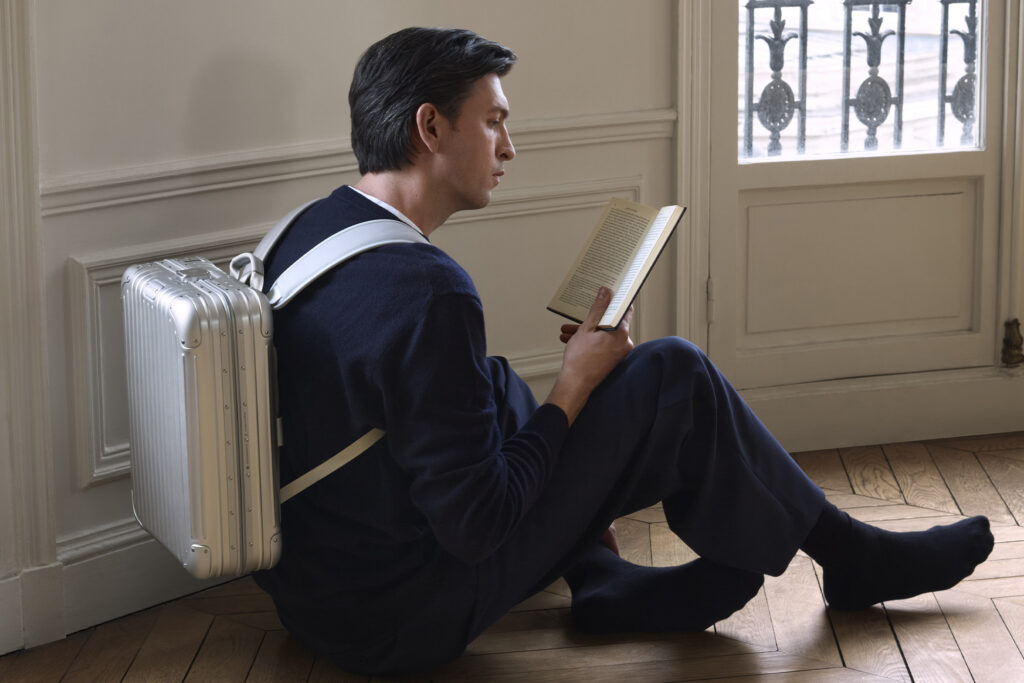 Nicholas Braun with RIMOWA Original Backpack. Photo courtesy of RIMOWA.