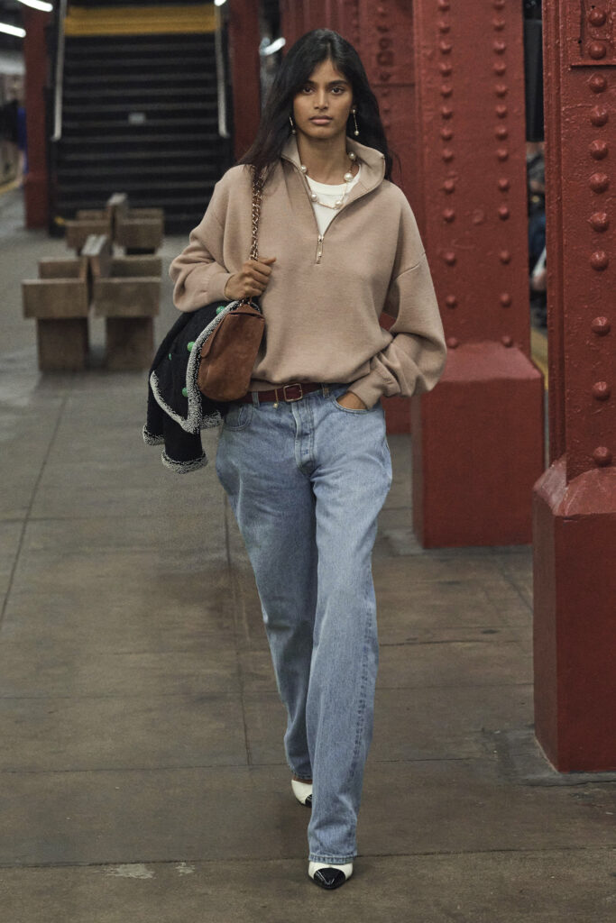 Matthieu Blazy’s first Chanel collection: a loosely fitted tan quarter-zip worn by model Bhavitha Mandava