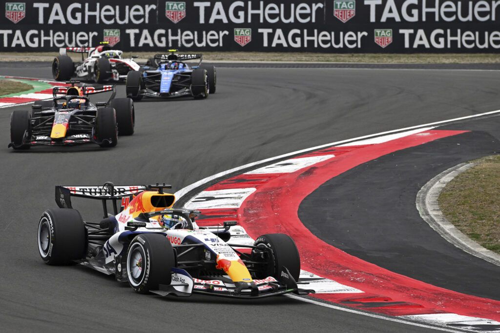 SHANGHAI, CHINA - MARCH 15: Arvid Lindblad of Great Britain driving the (41) Visa Cash App Racing Bulls VCARB 03 RB Ford leads Max Verstappen of the Netherlands driving the (3) Oracle Red Bull Racing RB22 Red Bull Ford on track during the F1 Grand Prix of China at Shanghai International Circuit on March 15, 2026 in Shanghai, China. (Photo by Rudy Carezzevoli/Getty Images) // Getty Images / Red Bull Content Pool // SI202603150433 // Usage for editorial use only // 
