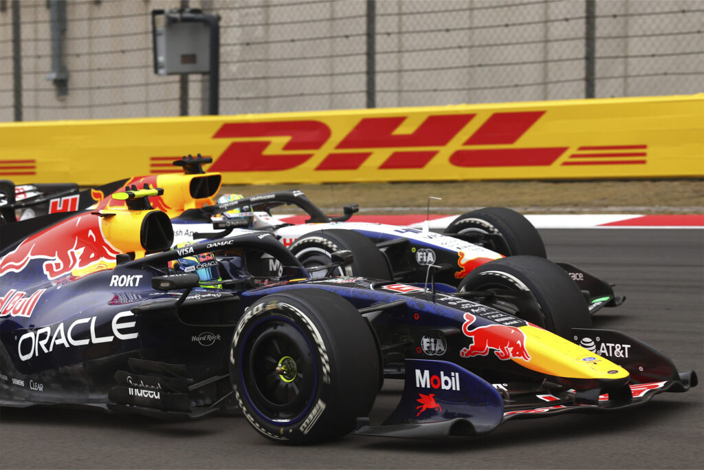 SHANGHAI, CHINA - MARCH 15: Isack Hadjar of France driving the (6) Oracle Red Bull Racing RB22 Red Bull Ford and Arvid Lindblad of Great Britain driving the (41) Visa Cash App Racing Bulls VCARB 03 RB Ford battle for track position during the F1 Grand Prix of China at Shanghai International Circuit on March 15, 2026 in Shanghai, China. (Photo by Andy Hone/LAT Images) // Getty Images / Red Bull Content Pool // SI202603150349 // Usage for editorial use only // 