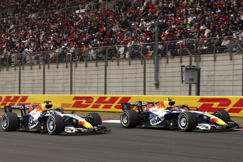 SHANGHAI, CHINA - MARCH 15: Liam Lawson of New Zealand driving the (30) Visa Cash App Racing Bulls VCARB 03 RB Ford and Arvid Lindblad of Great Britain driving the (41) Visa Cash App Racing Bulls VCARB 03 RB Ford battle for track position during the F1 Grand Prix of China at Shanghai International Circuit on March 15, 2026 in Shanghai, China. (Photo by Andy Hone/LAT Images) // Getty Images / Red Bull Content Pool // SI202603150280 // Usage for editorial use only // 