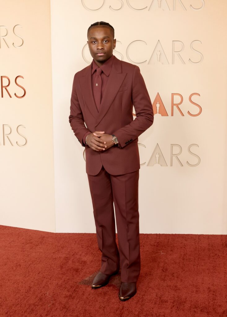 HOLLYWOOD, CALIFORNIA - MARCH 15: Miles Caton attends the 98th Oscars at Dolby Theatre on March 15, 2026 in Hollywood, California. (Photo by Mike Coppola/Getty Images)