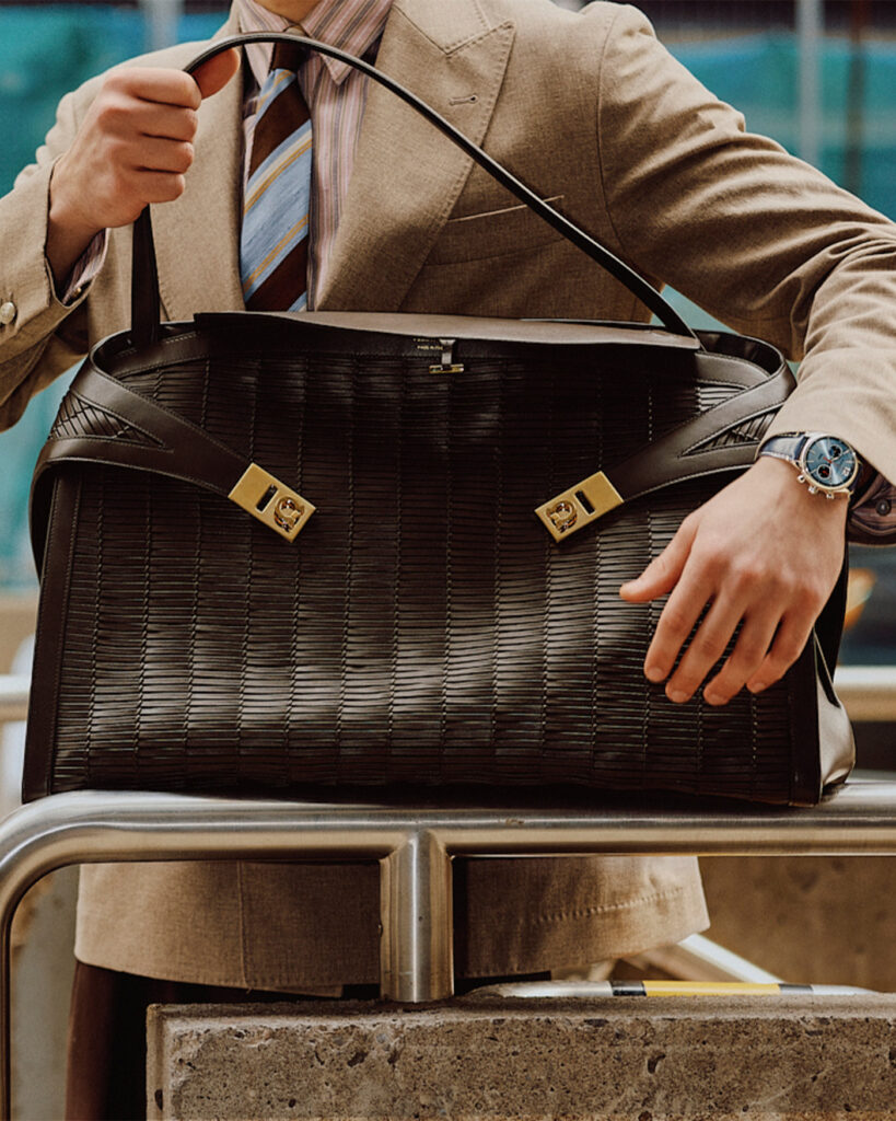 BLAZER ($6,500) BY BRUNELLO CUCINELLI; BAG ($5,880) BY FERRAGAMO; WATCH ($4,995) BY FRÉDÉRIQUE CONSTANT.