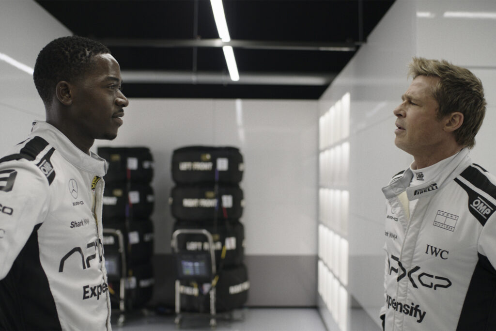 Damson Idris as Joshua Pearce and Brad Pitt as Sonny Hayes in Apple Original Films’ “F1 The Movie,” now streaming on Apple TV