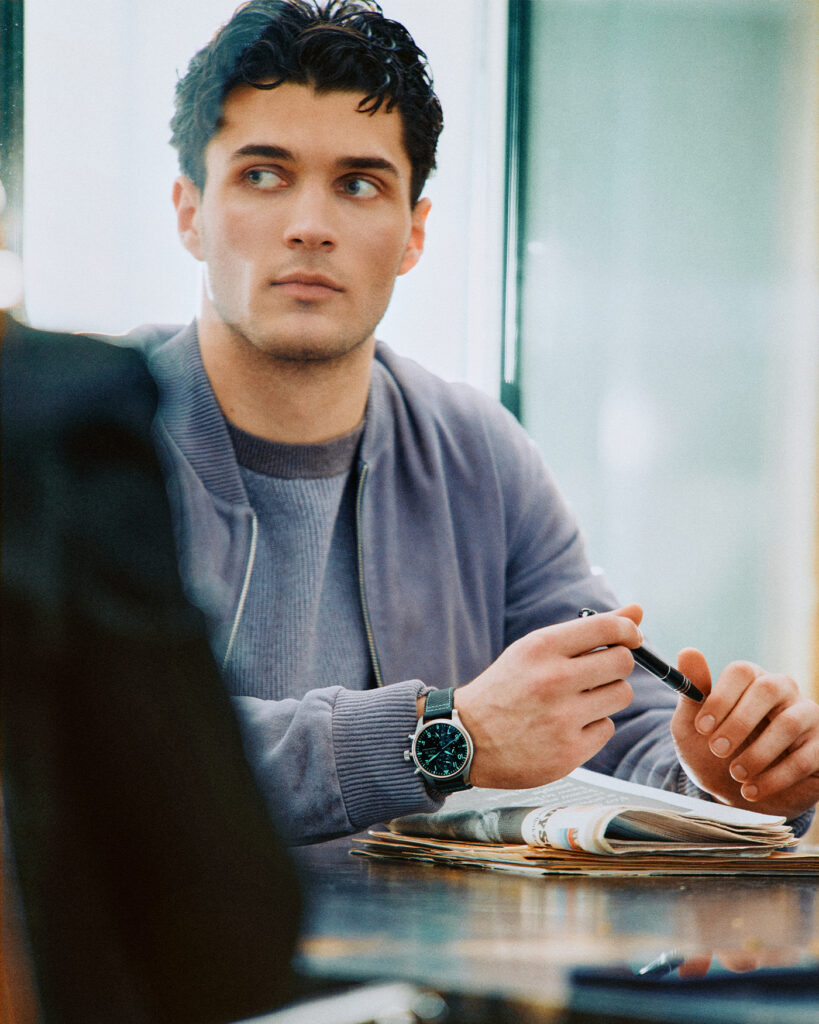 JACKET (9) AND SWEATER (9) BY BOSS; WATCH (,900) BY IWC.
