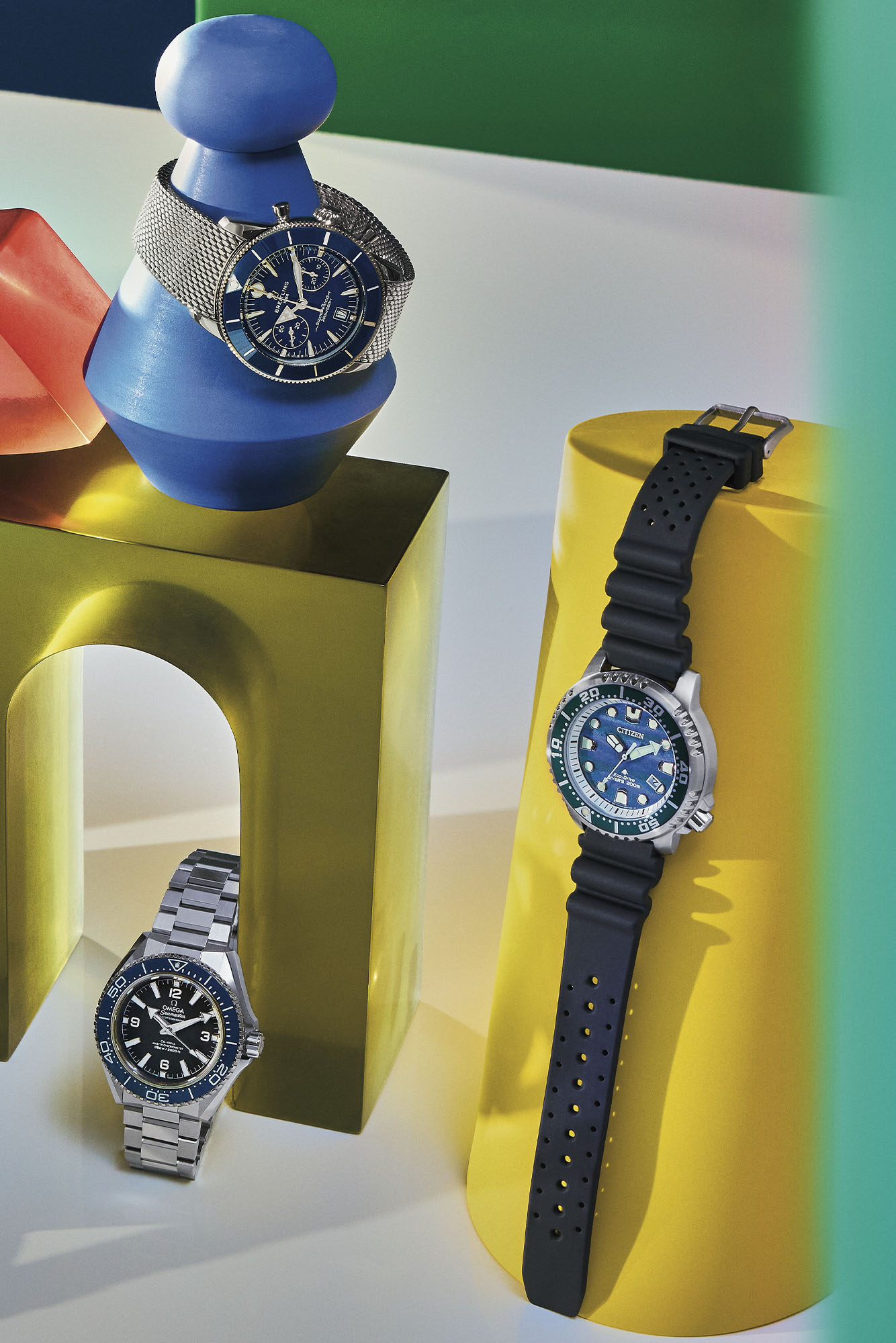 BREITLING SUPEROCEAN HERITAGE B01 CHRONOGRAPH, $11,500. CITIZEN PROMASTER DIVE, $625. OMEGA SEAMASTER PLANET OCEAN 600M, $12,100.