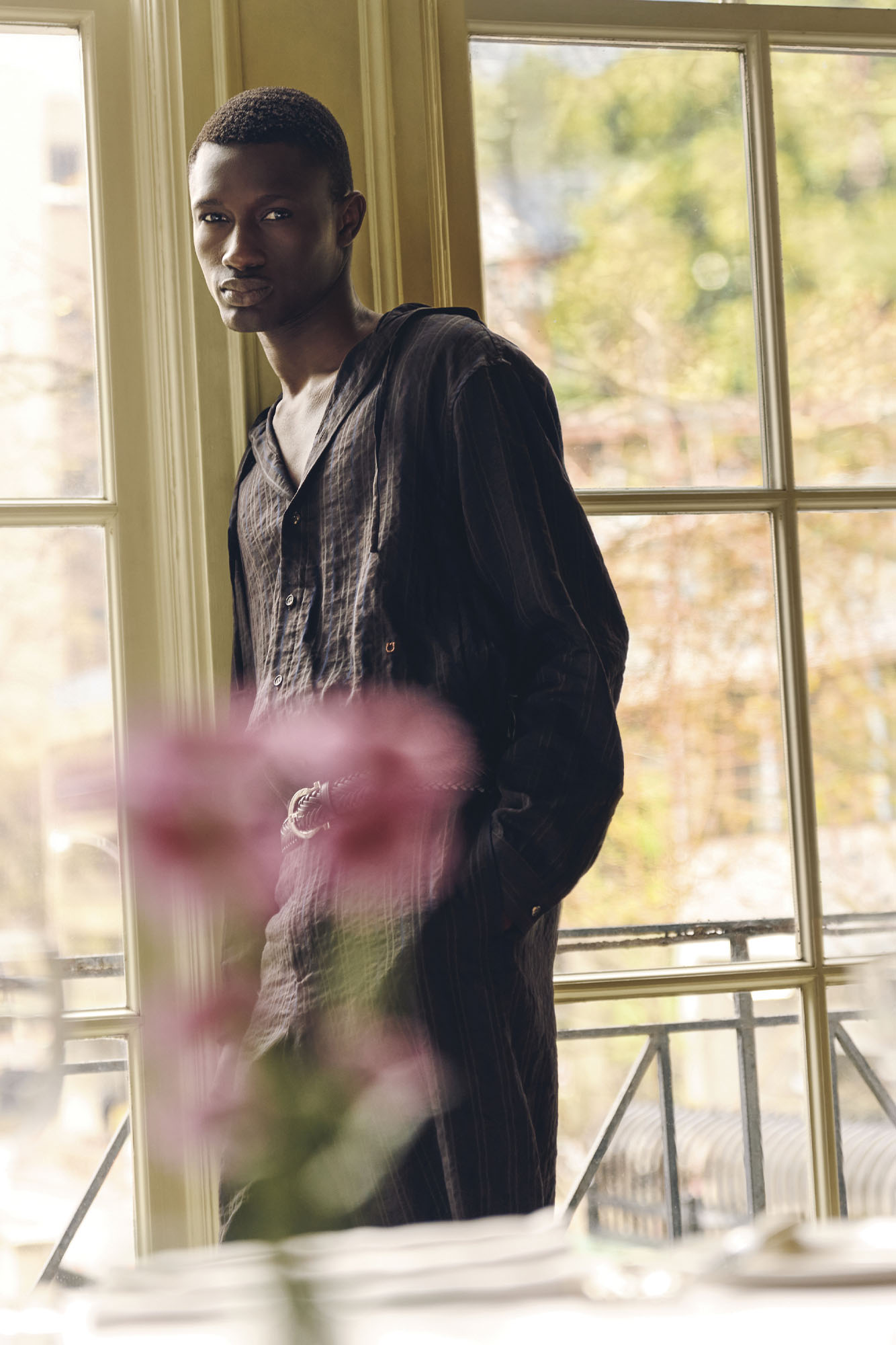 SHIRT ($1,940), PANTS ($1,170), AND BELT ($705) BY FERRAGAMO.