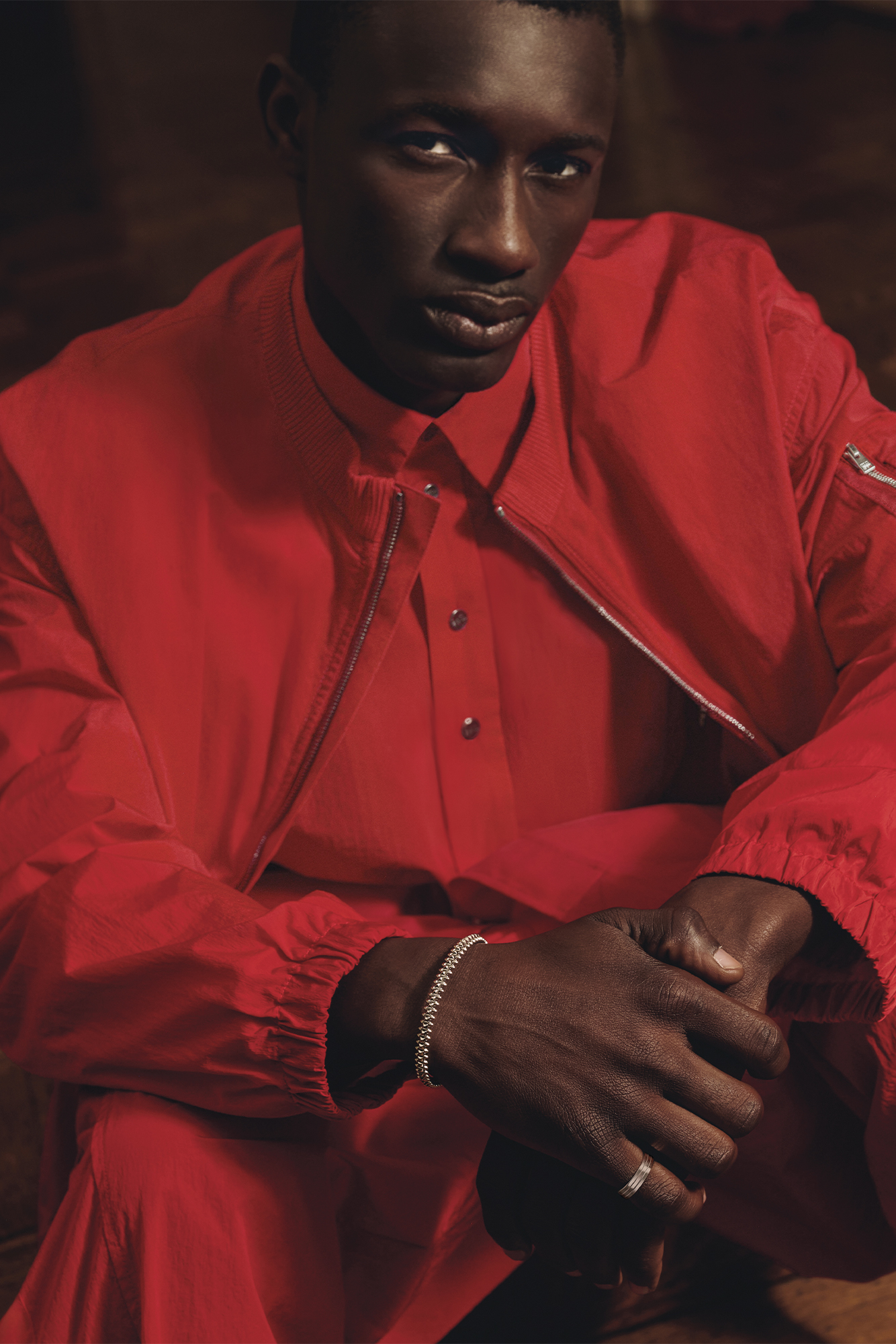JACKET ($3,250), SHIRT ($1,620), PANTS ($1,850), AND SHOES ($2,350) BY FENDI; RING ($3,250) AND BRACELET ($12,900) BY CARTIER.