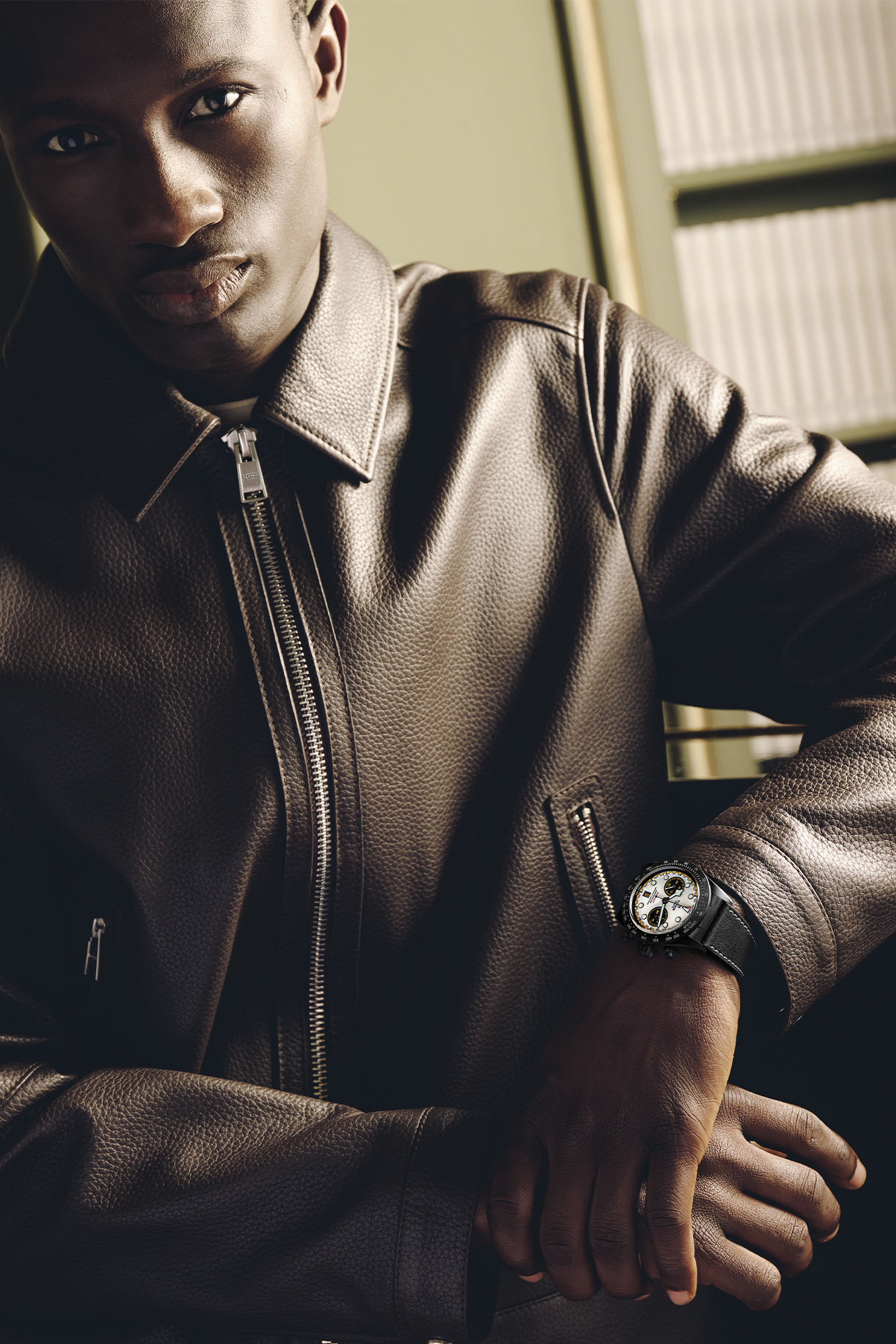 JACKET ($499) AND PANTS ($369) BY BOSS; WATCH ($10,770) BY TUDOR.
