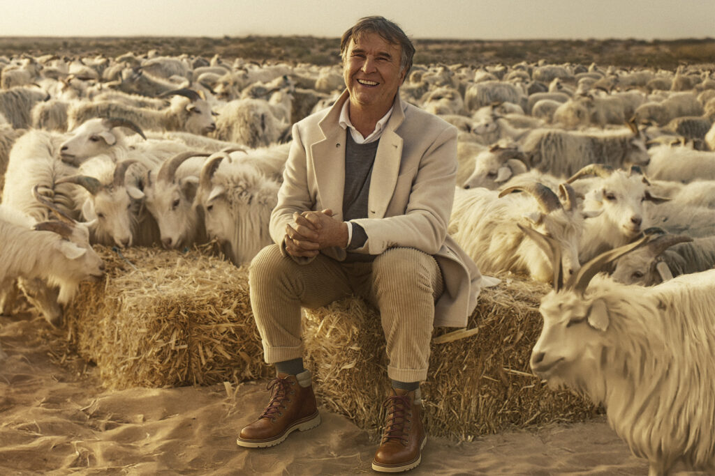 
Still from the film featuring Brunello Cucinelli among the cashmere goats in Mongolia.