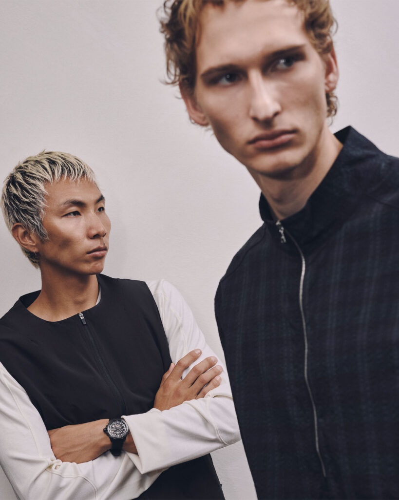 LEFT: VEST ($399), SHIRT ($497), AND PANTS ($413) BY LITERARY SPORT; WATCH ($5,990) BY NORQAIN. RIGHT: HALF ZIP ($497) BY LITERARY SPORT.