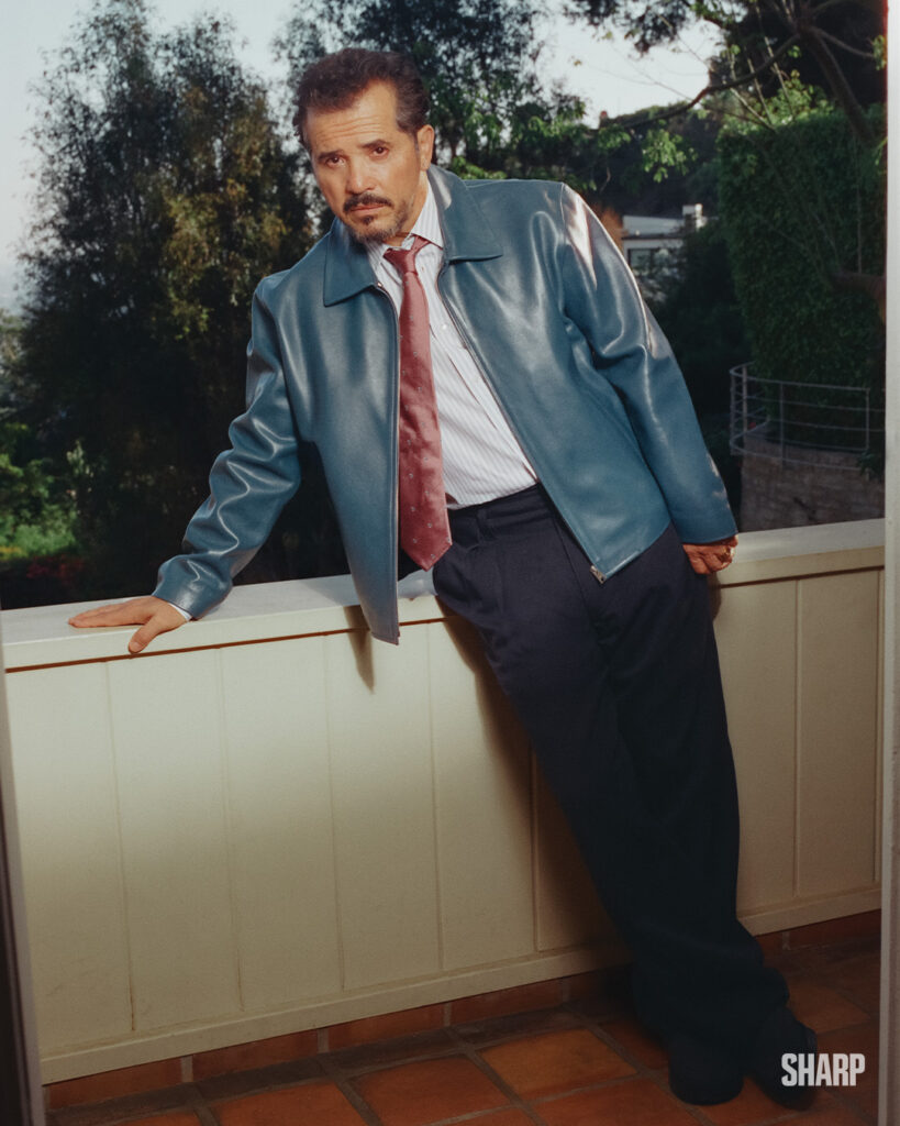 JACKET BY SANDRO; SHIRT, TIE, AND TROUSERS BY
PAUL SMITH; RINGS BY BVLGARI.