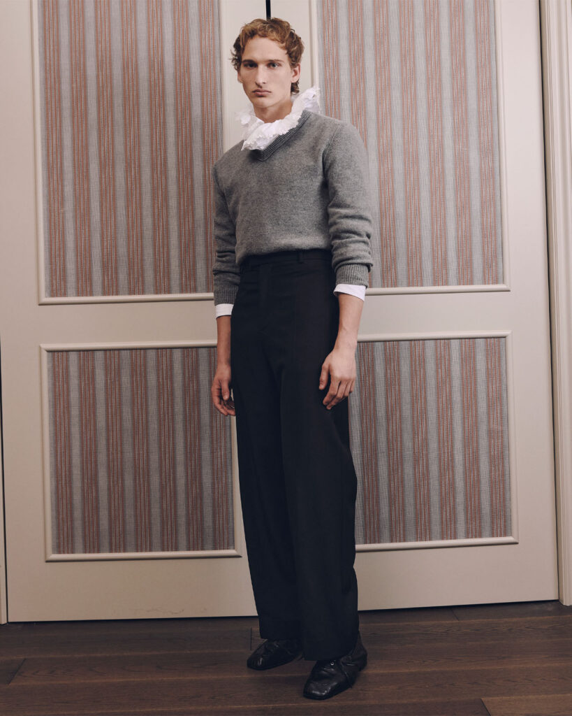 SWEATER ($2,080), SHIRT ($4,150), PANTS ($2,080), AND SHOES ($1,570) BY BOTTEGA VENETA.