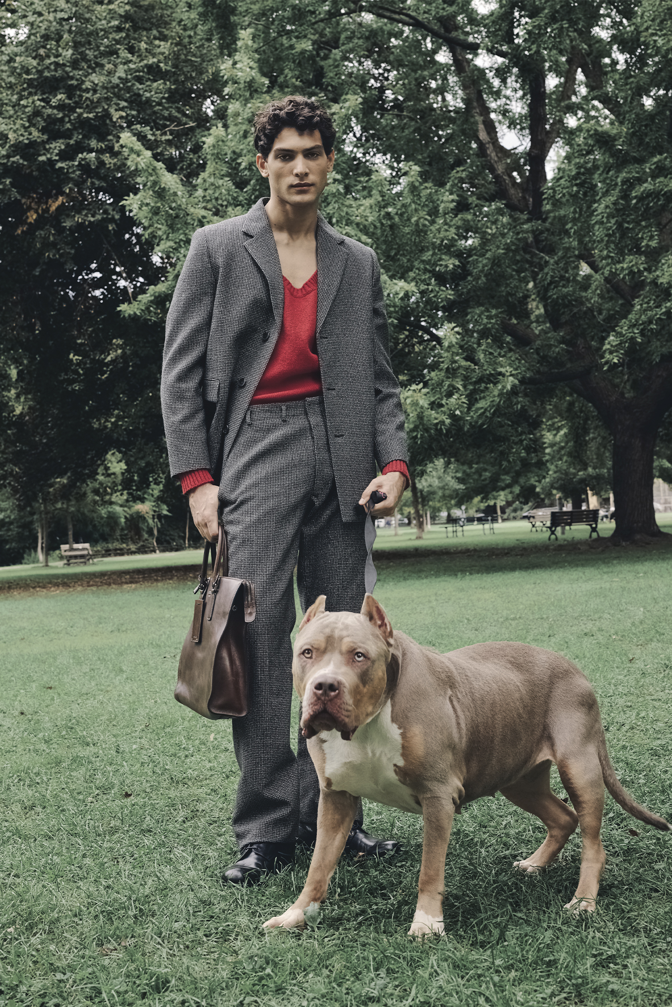JACKET ($5,300), SWEATER ($2,100), PANTS ($3,050), SOCKS ($220), AND SHOES ($2,300) BY PRADA. ($1,450), T-SHIRT ($1,620), PANTS ($2,120), TIE ($345), AND SHOES ($2,350) BY LOUIS VUITTON MEN’S.