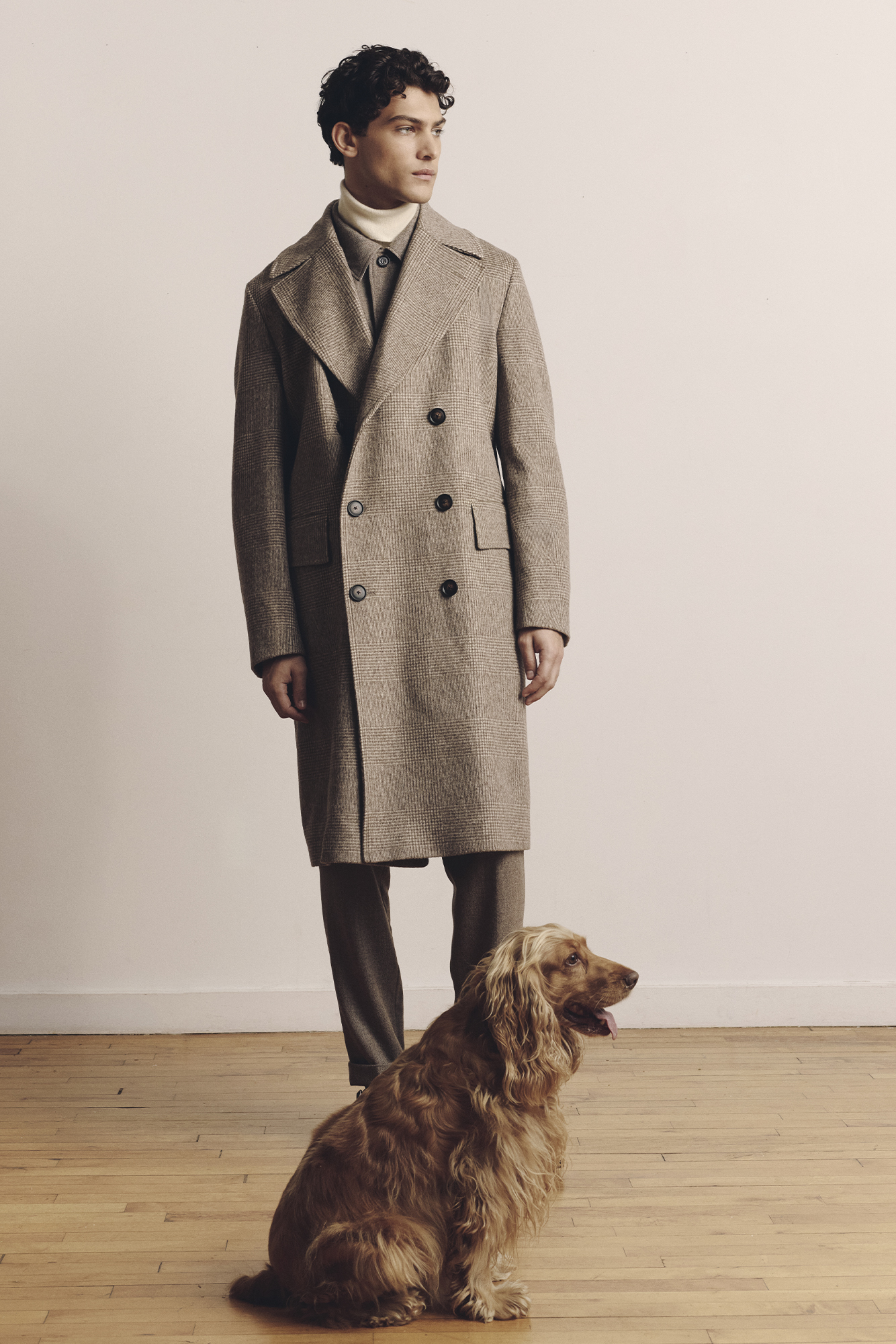 JACKET ($1,399), COAT ($999), SWEATER ($799), PANTS ($749), AND SHOES ($549) BY BOSS.