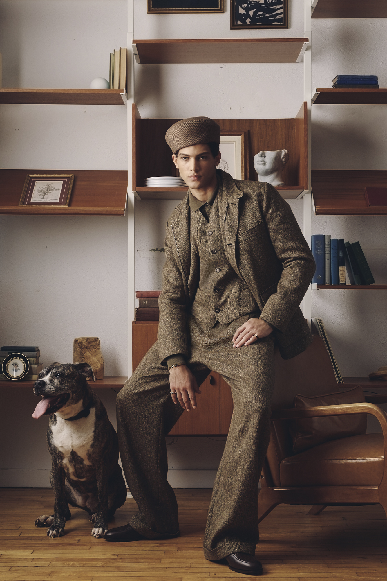 JACKET ($7,870), COAT ($6,860), VEST ($2,590), SHIRT ($3,180), PANTS ($3,350), HAT ($4,190), SOCKS ($250), AND SHOES ($2,180) BY LORO PIANA; BRACELET ($12,900) AND RING ($3,650), AND RING ($3,650) BY BVLGARI.