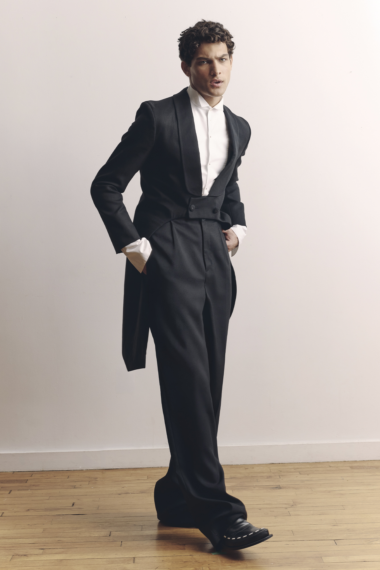JACKET ($5,800), SHIRT ($1,150), PANTS ($1,700), AND SHOES ($2,100) BY DIOR.