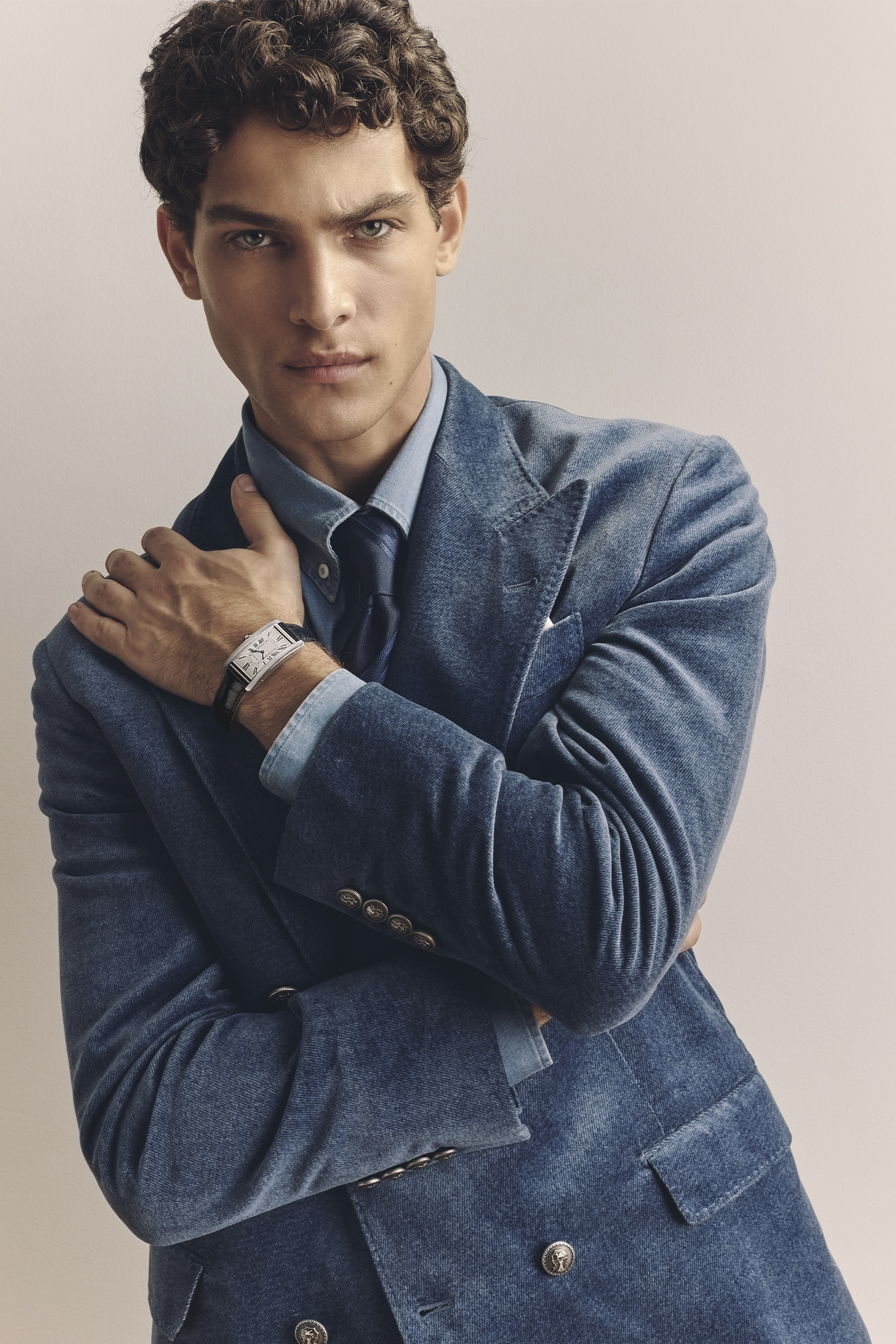 SUIT ($9,950), SHIRT ($1,050), POCKET SQUARE ($430), TIE ($500), SHOES ($2,400) BY BRUNELLO CUCINELLI; WATCH ($9,200) BY CARTIER